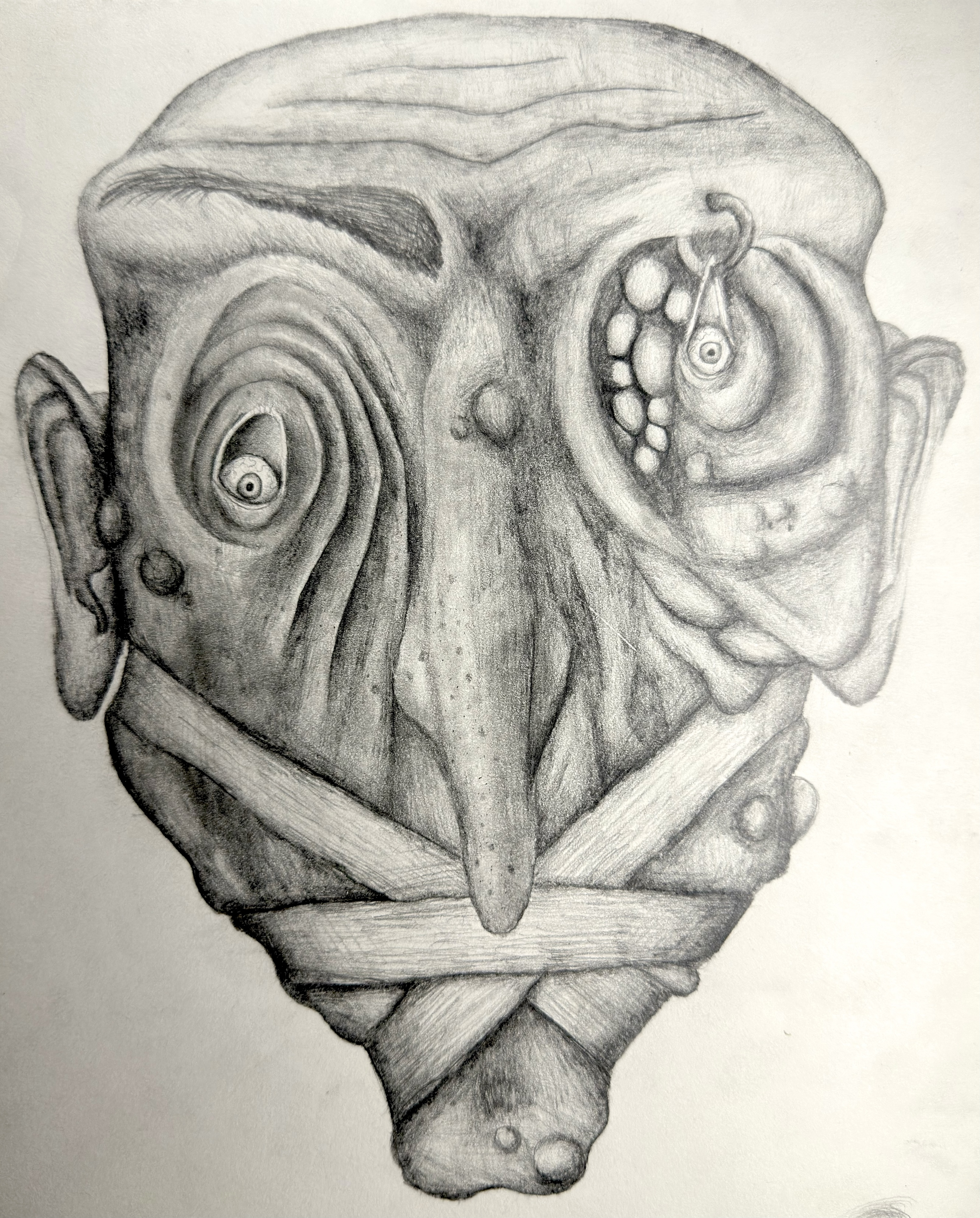 Disfigured Face Sketch: a graphite drawing using distortion, controlled shading, and imaginative portraiture to create an unsettling figure.