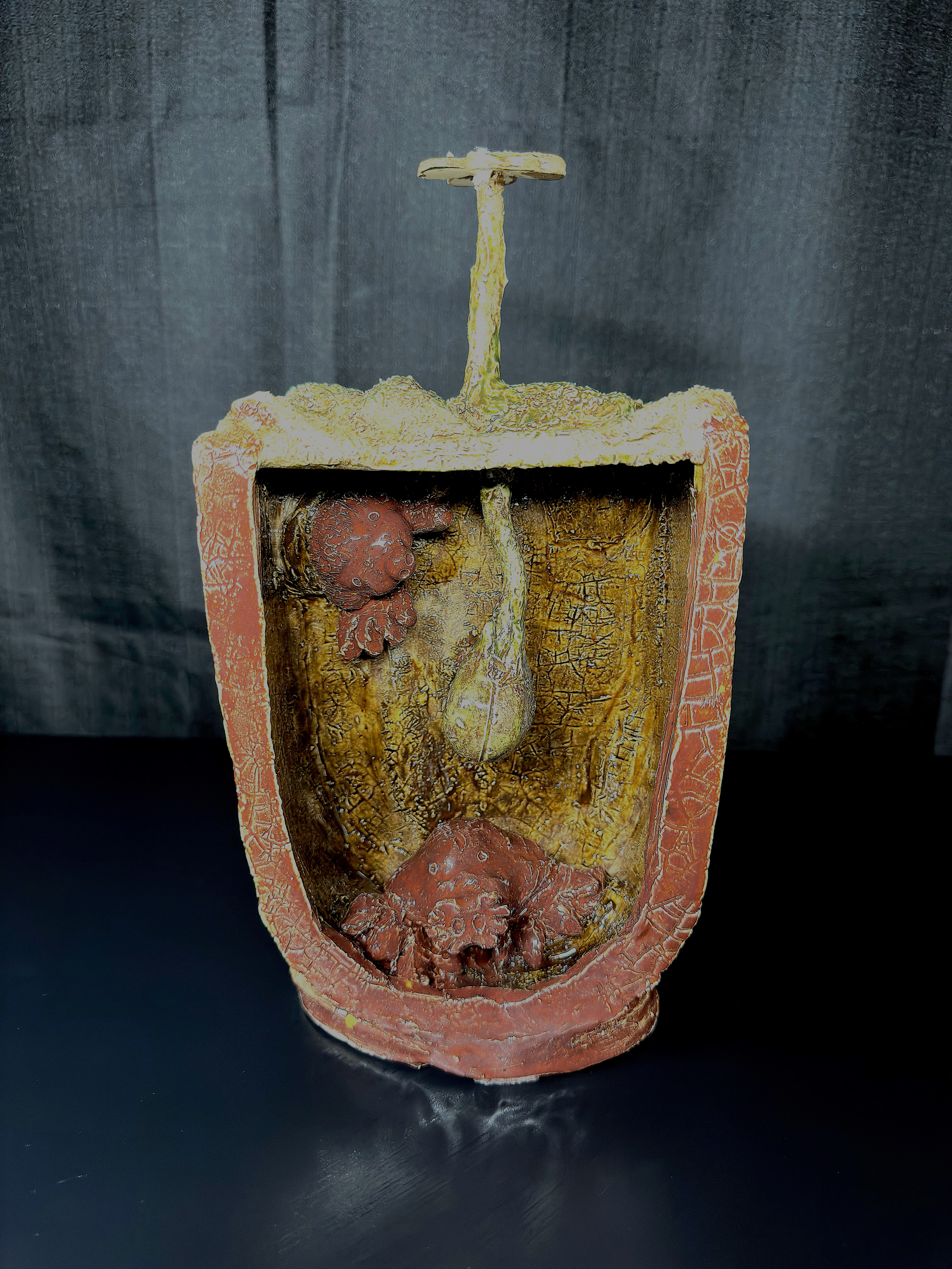 Moles Underground: a hand-built ceramic work using imaginative animal forms to create an underground scene in clay.